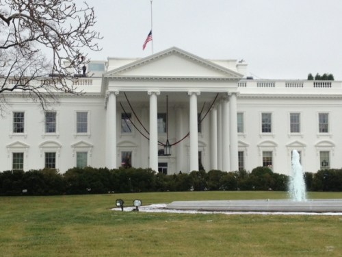 The Stars and Stripes at half-mast over the White House